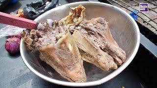 How to eat Goats Head in Nigeria [upl. by Ralyt147]