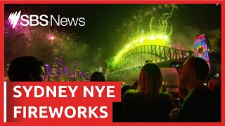 Sydney welcomes 2023 with dazzling rainbow New Years Eve fireworks display  SBS News [upl. by Town]