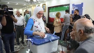 Iranians in Damascus head to the polls for Iranian presidential election [upl. by Leksehc149]