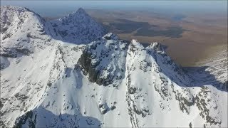 Black Cuillin winter ridge flight footage Skye Scotland from the air by drone [upl. by Ettevroc]