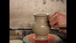 Throwing a pottery jug throw a clay pot pitcher on the potters wheel how to make a [upl. by Ayrb]