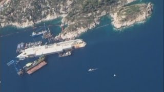 Costa Concordia Rare aerial footage of the stricken liner [upl. by Aynotal]