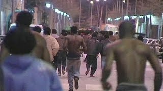 African migrants storm border into Spains Melilla [upl. by Cathe]