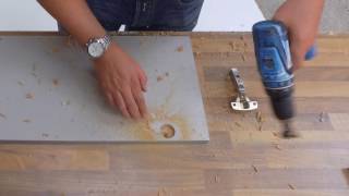 How to drill hinge hinge holes in kitchen doors  Kitchen Warehouse UK LTD [upl. by Leisam564]