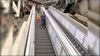 Raw Video Colombian City Gets Giant Escalator [upl. by Nosinned186]