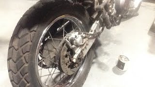 XT600e Rear Brake Caliper Rebuild  pistons and pads [upl. by Tnomad]