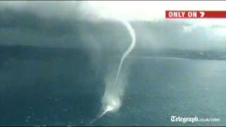 Dramatic water tornado appears off Australia coast [upl. by Poppas]