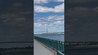 The Ambassador Bridge suspension bridge across the Detroit River to Detroit from Windsor [upl. by Enneite752]