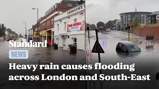 Heavy rains cause flooding and transport chaos across London and surrounding areas [upl. by Noraed]