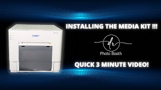 DNP RX1 Tips Installing the Media Kit Paper and ink into the printer [upl. by Everson224]