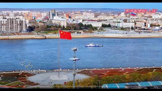 ChinaRussia border river and the Chinese city of Heihe and Russian city of Blagoveshchensk [upl. by Enegue]