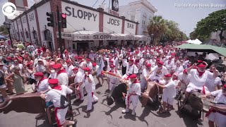 Hemingway lookalikes spoof Running of the Bulls in Florida [upl. by Lauraine]