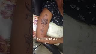 Unalem tattoo with flower cell 254715001722 inkerstattooskenya tattoo nairobi [upl. by Fidelas523]