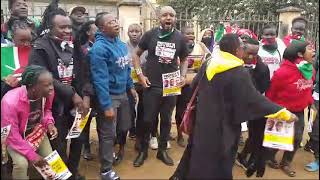 Boniface Mwangi leads a demonstration shortly after release from police cell [upl. by Cicenia873]