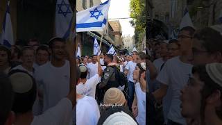 Group of Jews dancing with Israeli flags in the Muslim Quarter in Jerusalem Israel 2024 [upl. by Sonstrom868]