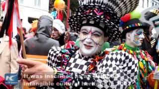 Colorful parade kicks off Belgiums Binche Carnival [upl. by Sirtaeb184]