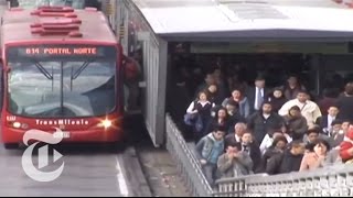 The Buses of Bogotá  The New York Times [upl. by Cherrita]