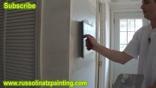 Skim Coating a Small Wall using a 12 inch Marshaltown Trowel [upl. by Eneloc1]