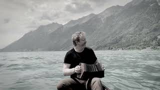 Cormac Begley playing an Irish slow air on a canoe in Switzerland [upl. by Nylahs]