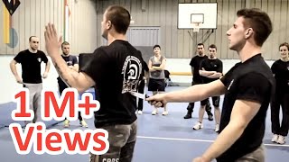 KRAV MAGA TRAINING • How to disarm a knife in your back [upl. by Ennaharas303]