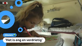 Families in Oekraïne vluchten met de trein naar veilig gebied [upl. by Amikehs]