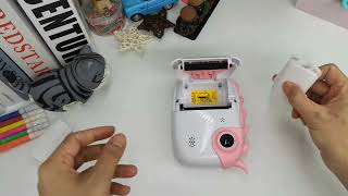 How do you put paper in a instant camera [upl. by Dreher]