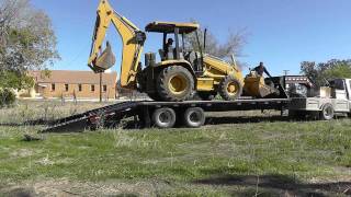 How To Load A Backhoe [upl. by Trimmer]