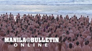 Bondi beachgoers bare all for art installation and cancer awareness in Australia [upl. by Willmert]