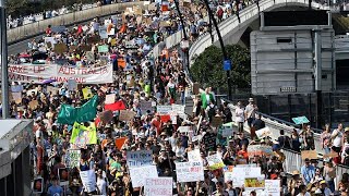 Global climate strikes kick off ahead of UN summit on climate change [upl. by Ayerhs790]