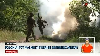 Mulți tineri polonezi își petrec vacanța de vară în tabere militare [upl. by Lucita]