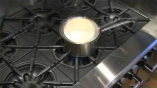 How to Boil Milk  Cooking Basics by Yummly [upl. by Rockefeller]