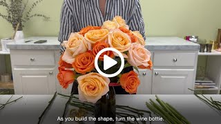 How To Make a Wine Bottle Floral Centerpiece [upl. by Blackington721]