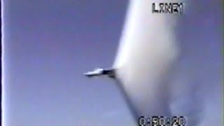 Jet Breaking Sound Barrier over Water F14 Tomcat Fighter Plane in Supersonic Low Flyby US Navy Ship [upl. by Kendyl]