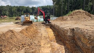 Digging Footings Flooding Rains Add To Culvert Upgrades [upl. by Xela]