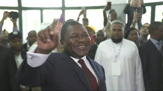 Mozambiques Filipe Nyusi votes as polls open in tense election  AFP [upl. by Anahcar]