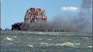 Capsized cargo ship catches fire [upl. by Sakhuja809]