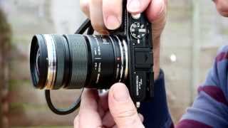 A Look At The Olympus 1250mm f35f63 Zoom Lens [upl. by Aneleasor]