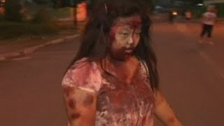 Zombie run Braineating undead army in Philippines race [upl. by Lundberg]