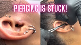 Jonys Vlog 010 Removing Swollen Tragus Piercing [upl. by Nalda]