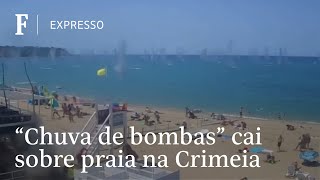 Banhistas fogem de chuva de bombas na Crimeia [upl. by Aiepoissac172]