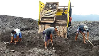 sand mining  the activity of miners digging sand and loading it into truck beds  andhry ex [upl. by Verena236]