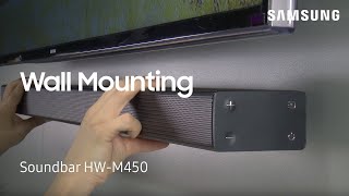 How To Wall Mount Your HWM450 Flat Soundbar  Samsung US [upl. by Bohi]