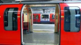 Central Line train doors open both sides [upl. by Nosyt]