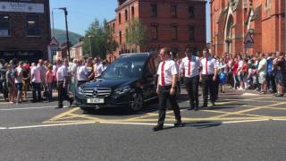 Thousands attend funeral of popular West Belfast man James Moore [upl. by Arrat]