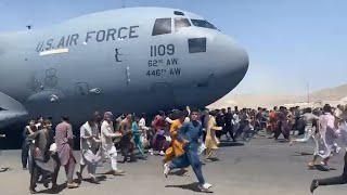 Watch Afghans Run Alongside US Military Plane At Kabul Airport [upl. by Ennayhc]