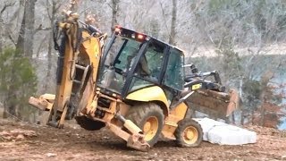 Cat 420E Backhoe Moving a 7000 Pound Limestone Block [upl. by Nohsreg]