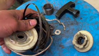 How To o Fix a Pull Starter Recoil Spring and Replace a Stuck or l Brush Cutter Starter Repairing [upl. by Asserrac]