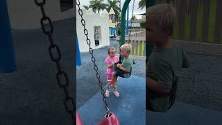 Kids having fun on the swings at Tiger shark cove park Outdoors Funny Playing [upl. by Sherborn]