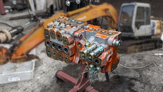 Excavator Rebuild valve control block disassembly  Hitachi EX1202 [upl. by Nnayhs589]