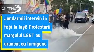 Jandarmii intervin în foţă la Iaşi Protestarii marşului LGBT au aruncat cu fumigene [upl. by Kohler80]